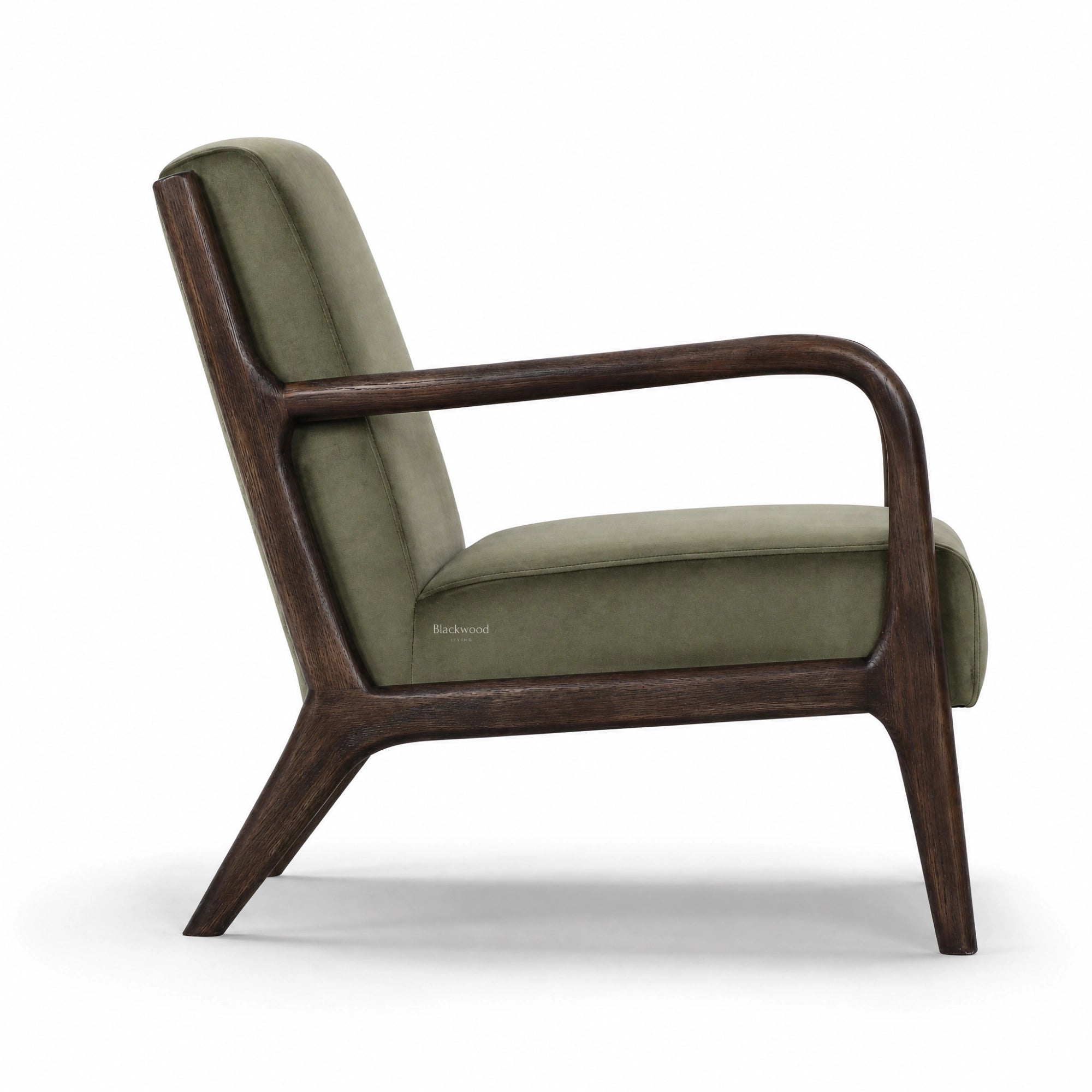 Java Occasional Chair with a dark oak frame and deep green velvet upholstery.