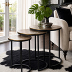 Calcutta Nesting Side Tables Set/3 with slender iron frames and aged aluminium tops in a living room
