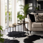 Calcutta Nesting Side Tables Set/3 with slender iron frames and softly aged aluminium tops in a stylish living room.