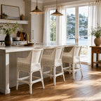 Singapore Counter Stool - White: woven rattan stools around a white marble kitchen island.