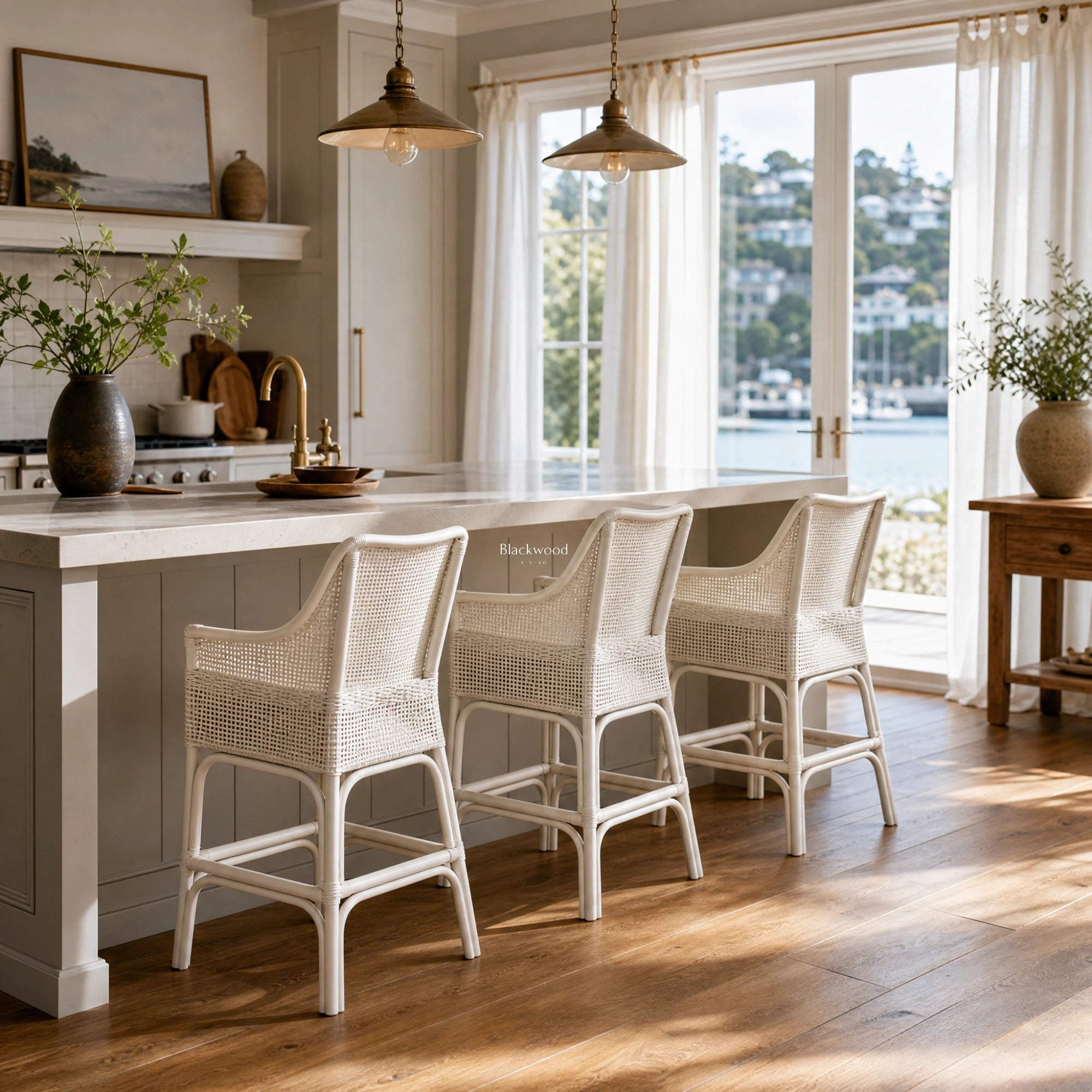 Singapore Counter Stool - White: woven rattan stools around a white marble kitchen island.