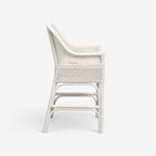 Singapore Counter Stool in white, woven rattan with curved back and lattice-style sides.