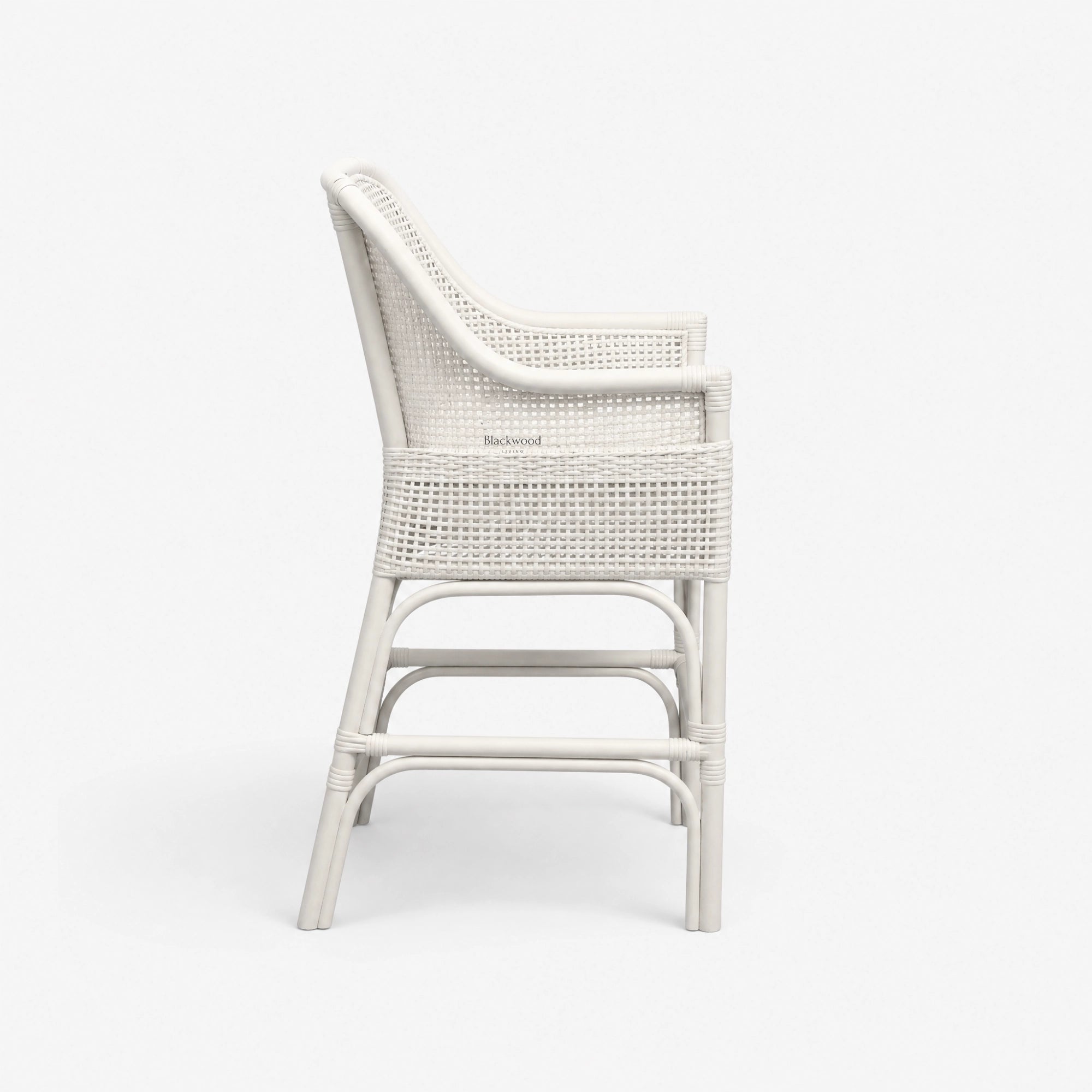 Singapore Counter Stool in white, woven rattan with curved back and lattice-style sides.