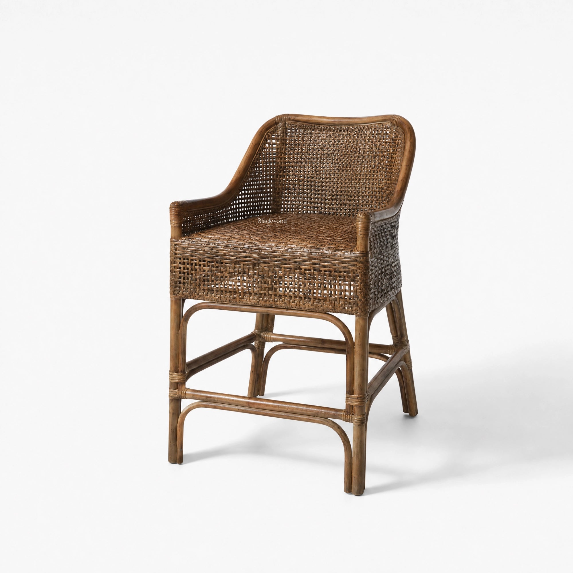 Singapore Counter Stool in coffee finish, natural rattan weave with a gently curved silhouette.