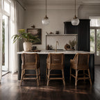 Singapore Counter Stool - Coffee: natural rattan stools with curved silhouette around a marble kitchen island.