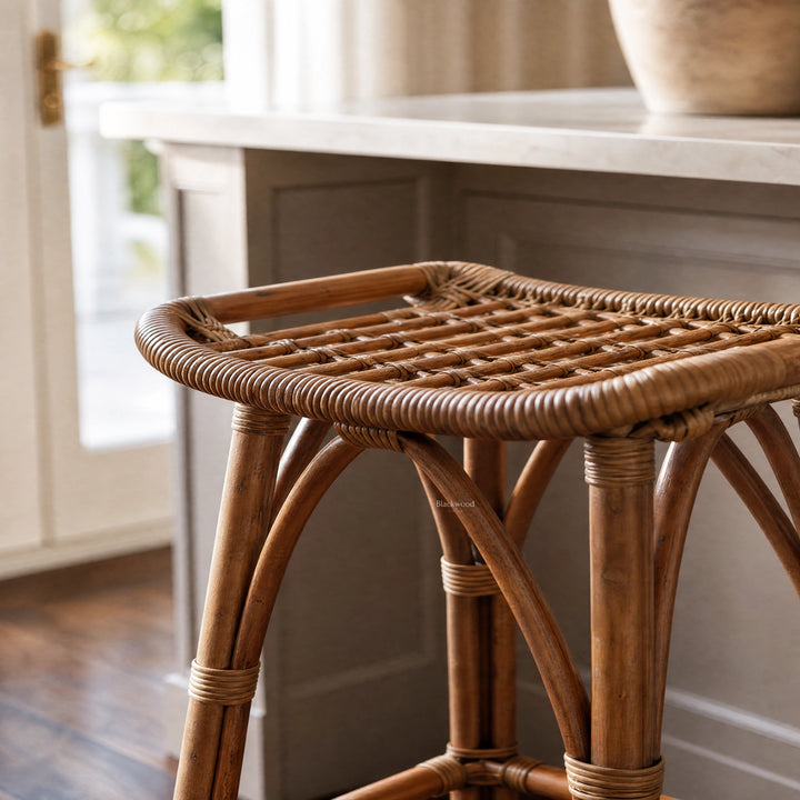 Sika Salsa rattan counter stool with natural woven seat and antique-toned finish, handcrafted from Indonesian rattan.