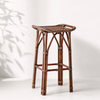 Sika Salsa Rattan Counter Stool, handwoven natural rattan with curved seat and antique finish.