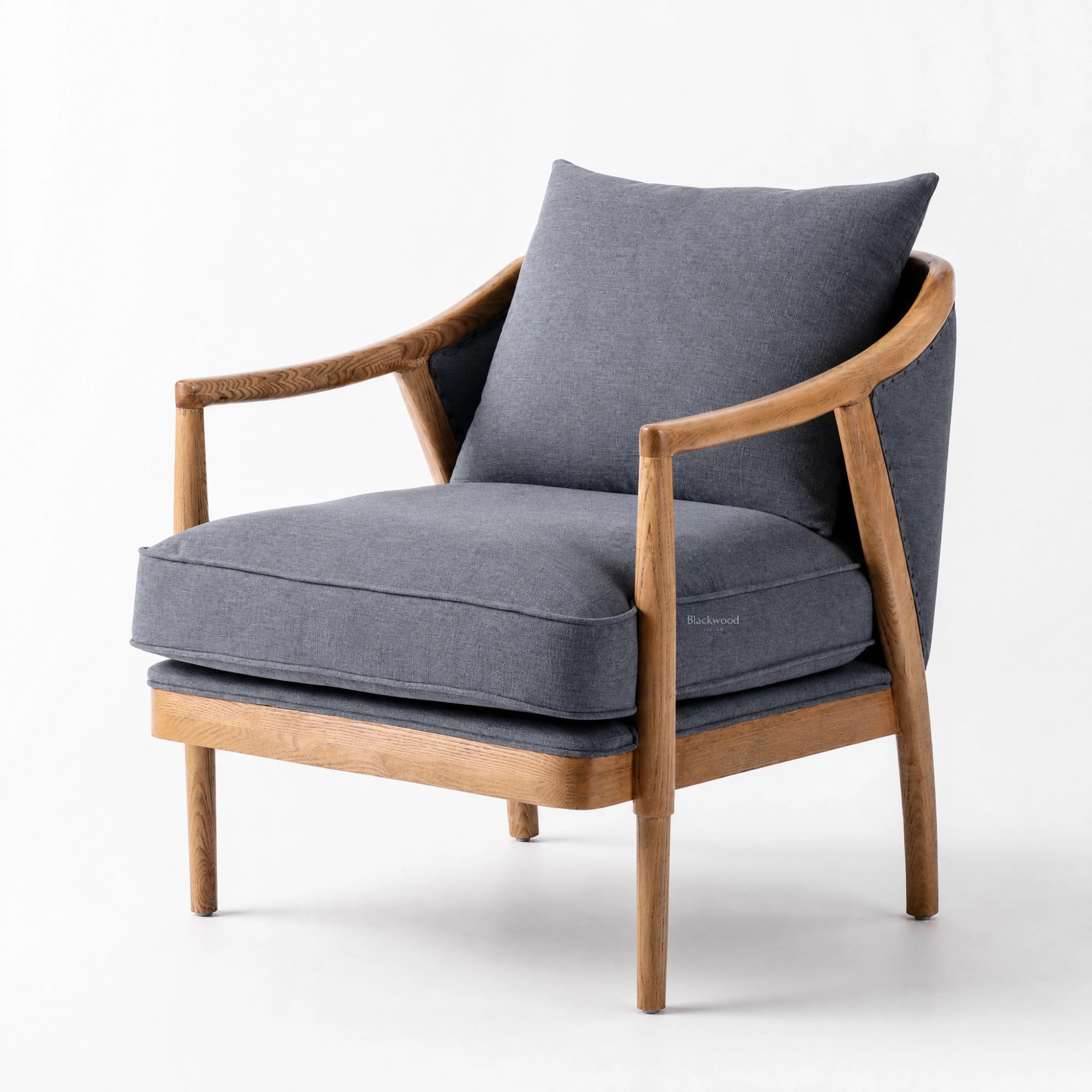 Westport Occasional Chair in Atlantic Blue with a solid timber frame, oak arms, and plush cushioned fabric.