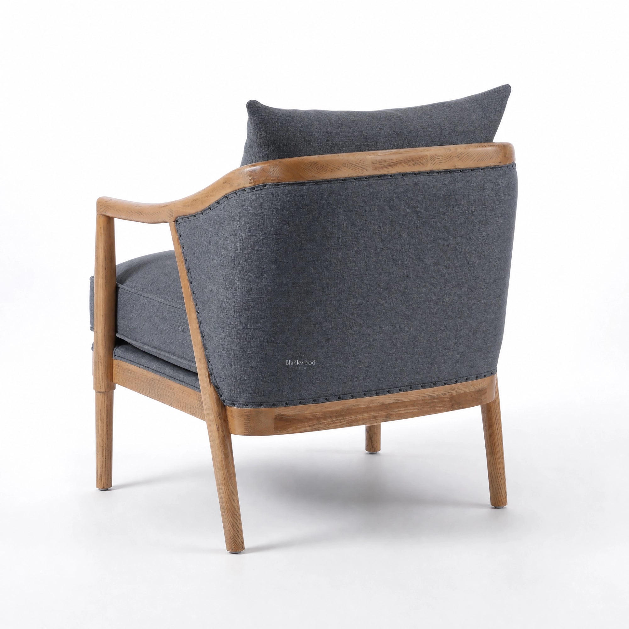Westport Occasional Chair Atlantic Blue with cushioned seating, exposed timber frame and oak arms.