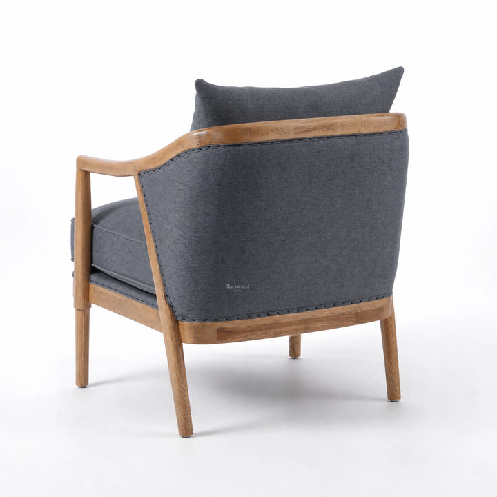 Westport Occasional Chair Atlantic Blue with cushioned seating, exposed timber frame and oak arms.