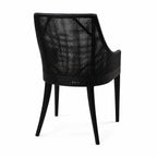 Barbados Dining Chair in black woven rattan with a curved back and arms for plantation-inspired dining.