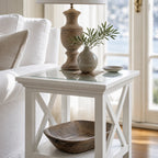 Newport Side Table with glass top and white cross-legged frame in a bright Hamptons-style living room.
