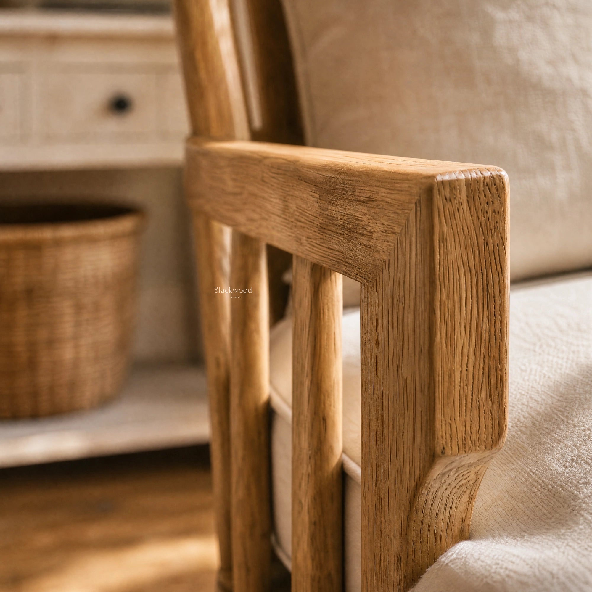 Sorrento Lounge Chair with warm oak frame and linen upholstery, close-up of the armrest.