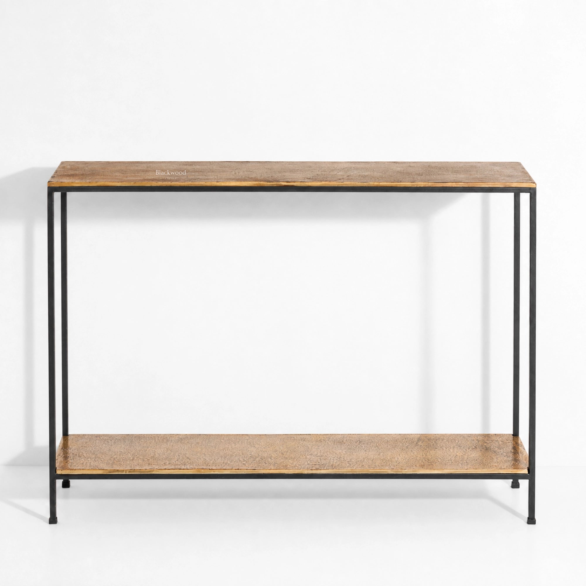 Assam Console Table with aluminium top in antique brass texture and a matte black frame.