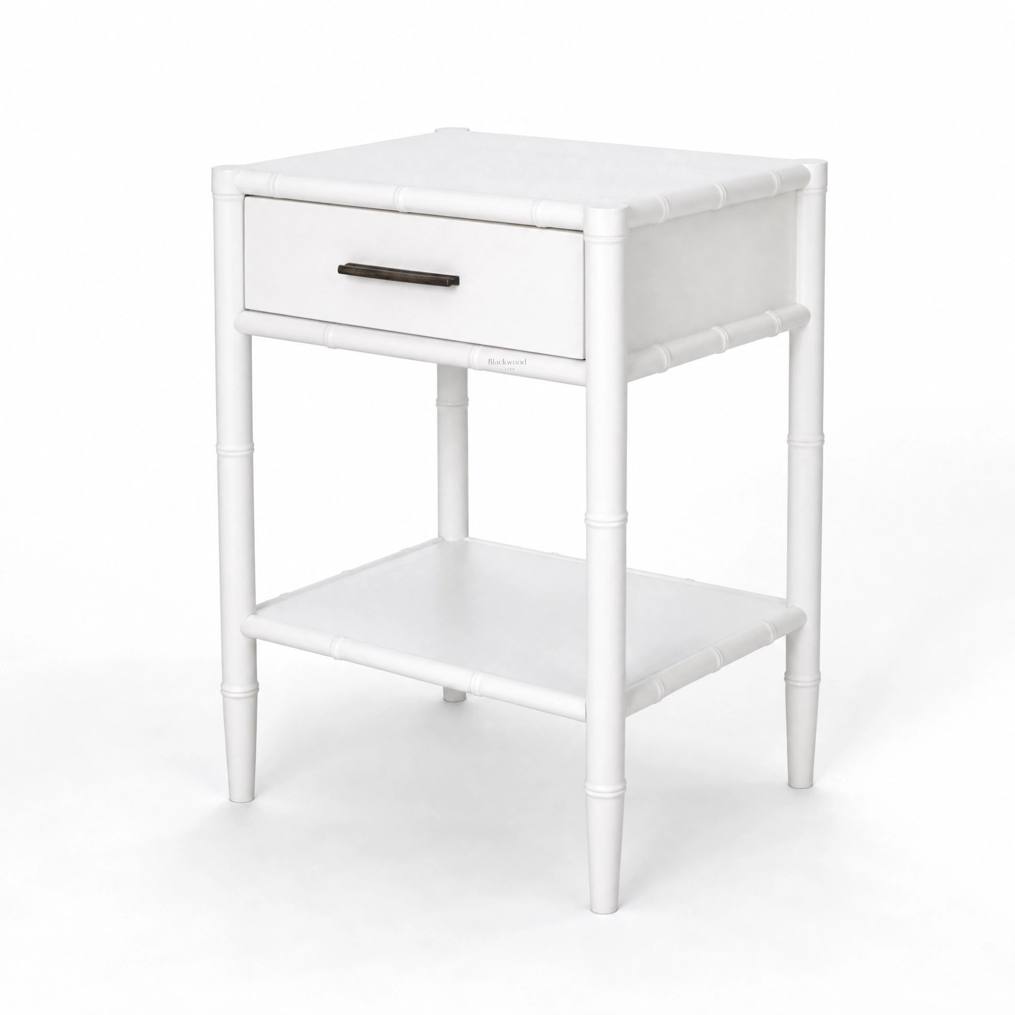 Rangoon Bedside Table in white with a single drawer and lower shelf, bamboo-style frame.