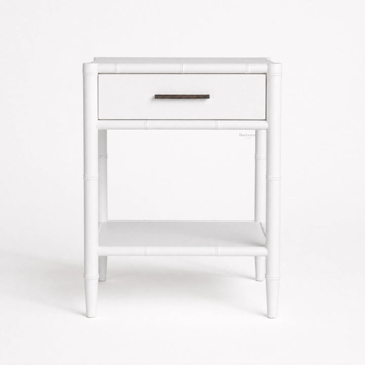 Rangoon Bedside Table - White, British colonial-inspired design with a single drawer and dark metal handle.