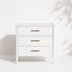 Rangoon 3-Drawer Bedside in white with brass handles and bamboo detailing.