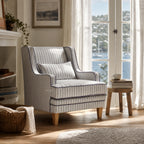 Anchorage Lounge Chair Newport Stripe with solid wood frame and tailored upholstery in a sunlit coastal living room
