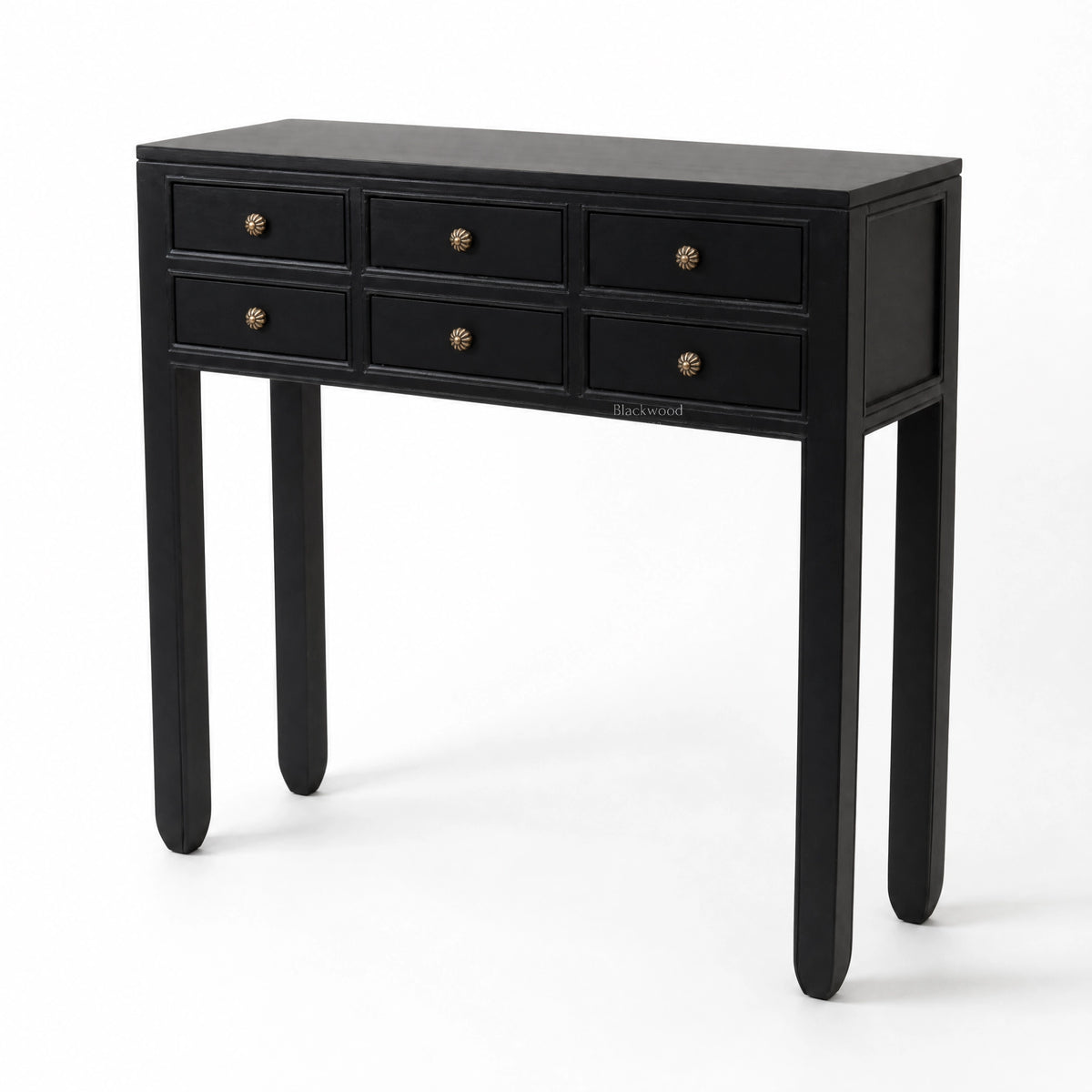 Black Penang hall table with slender profile, six drawers, and warm-toned metal handles for entryway or living space.