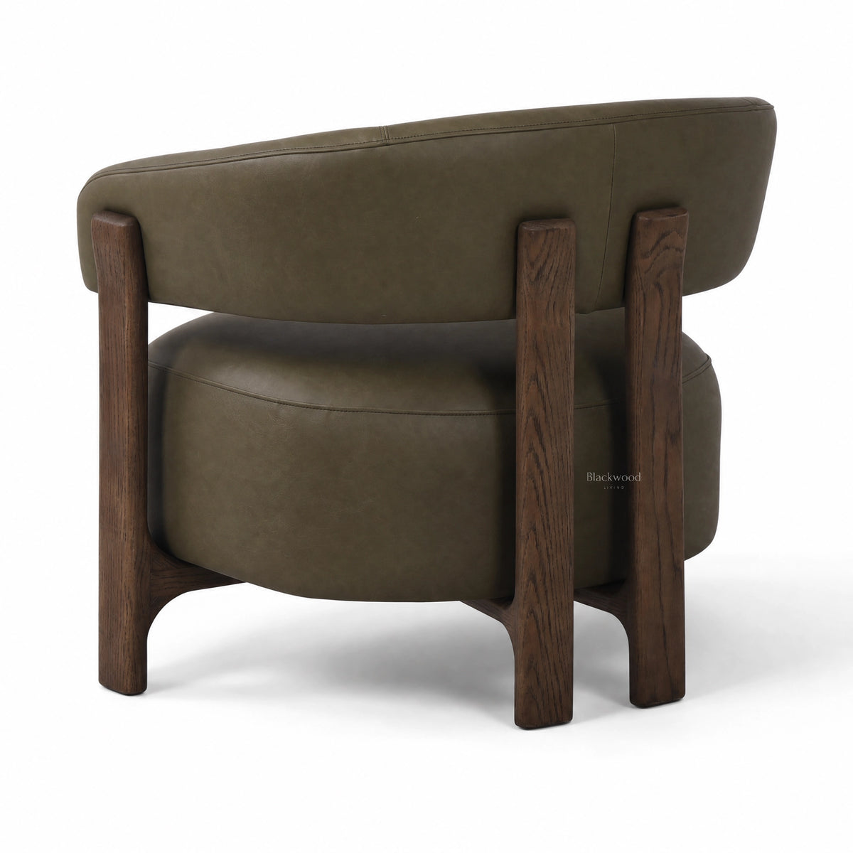 Rear view of olive top grain leather armchair with curved back and solid ash timber frame.