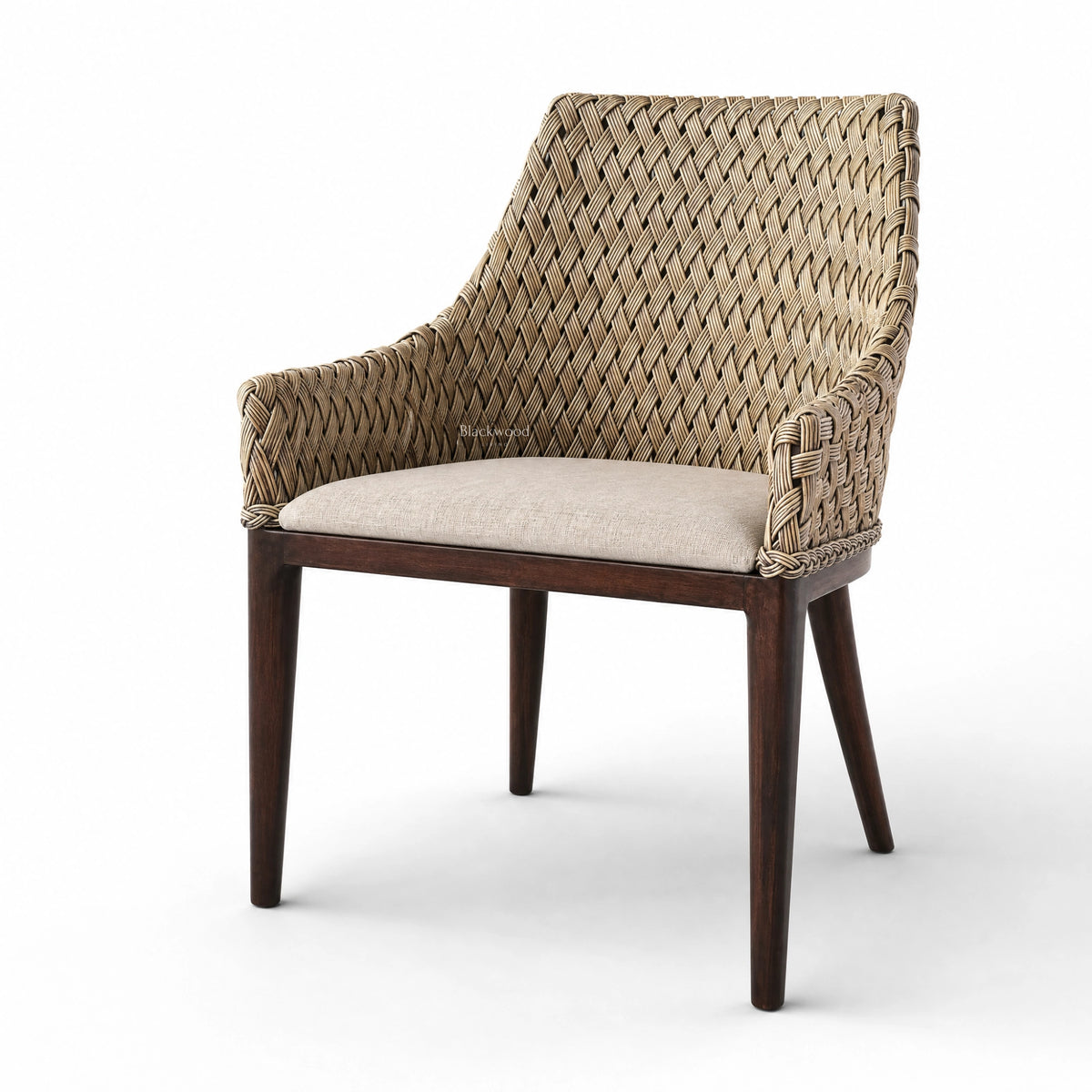 Woven rattan dining chair with solid timber frame, armrests, and cushioned seat in relaxed plantation style.