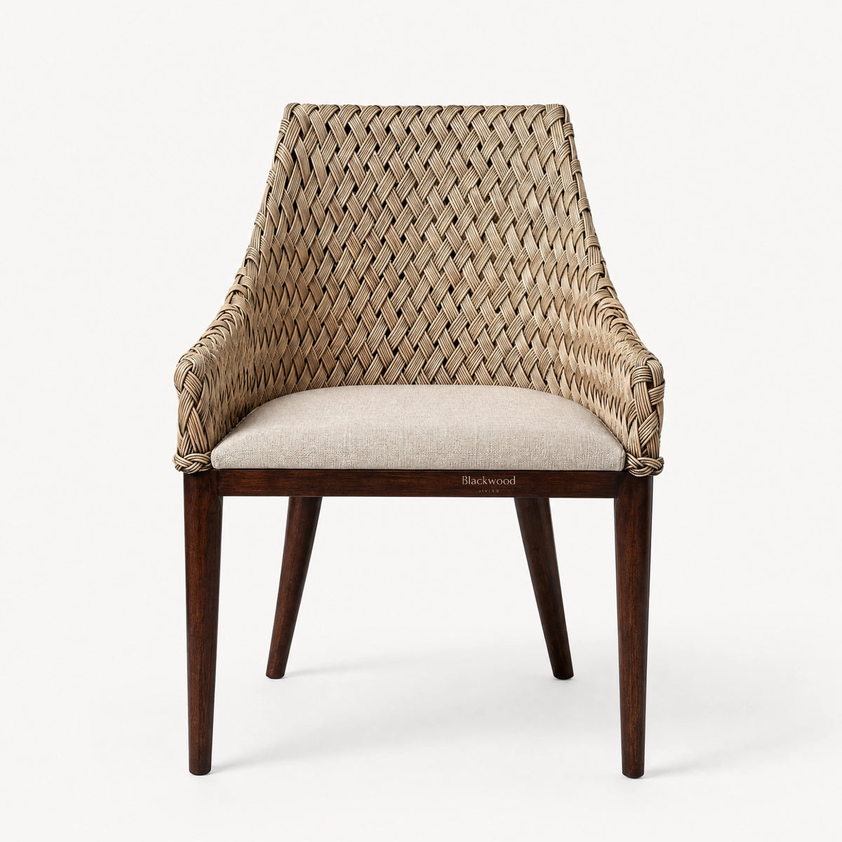 Plantation-style dining chair with hand-woven rattan back, solid timber frame, and cushioned seat.