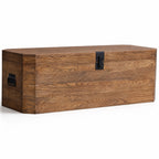 Reclaimed elm storage trunk with black metal hardware, featuring warm wood grain and a nautical old-world aesthetic.