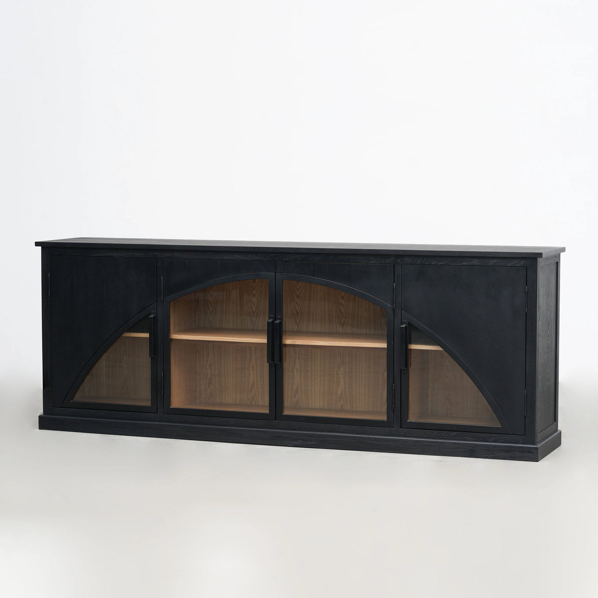 Black archway sideboard with glass doors, deep black finish, and warm timber interior shelves crafted from elm.