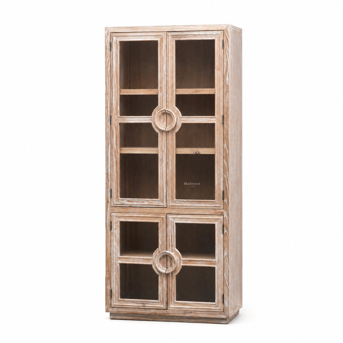 Tall coastal elm cabinet with glazed doors and distinctive circular nautical-style handles, bringing maritime character to interior spaces.