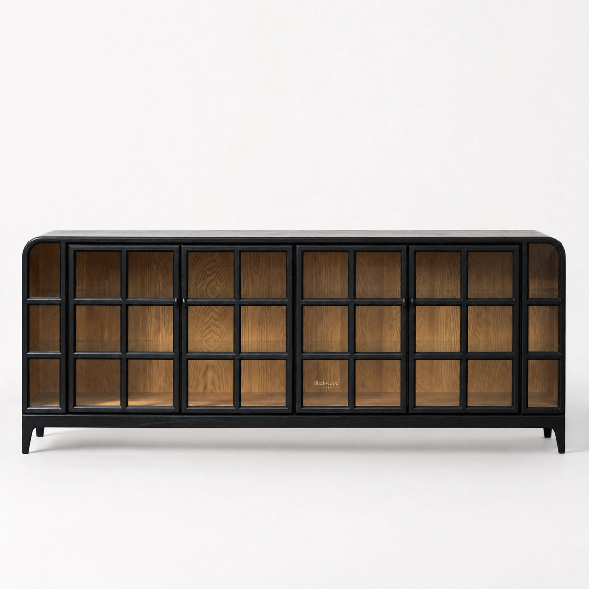 Heritage-inspired sideboard with black frame, glazed grid doors, and warm ash wood interior. Generous scale with rounded corners.