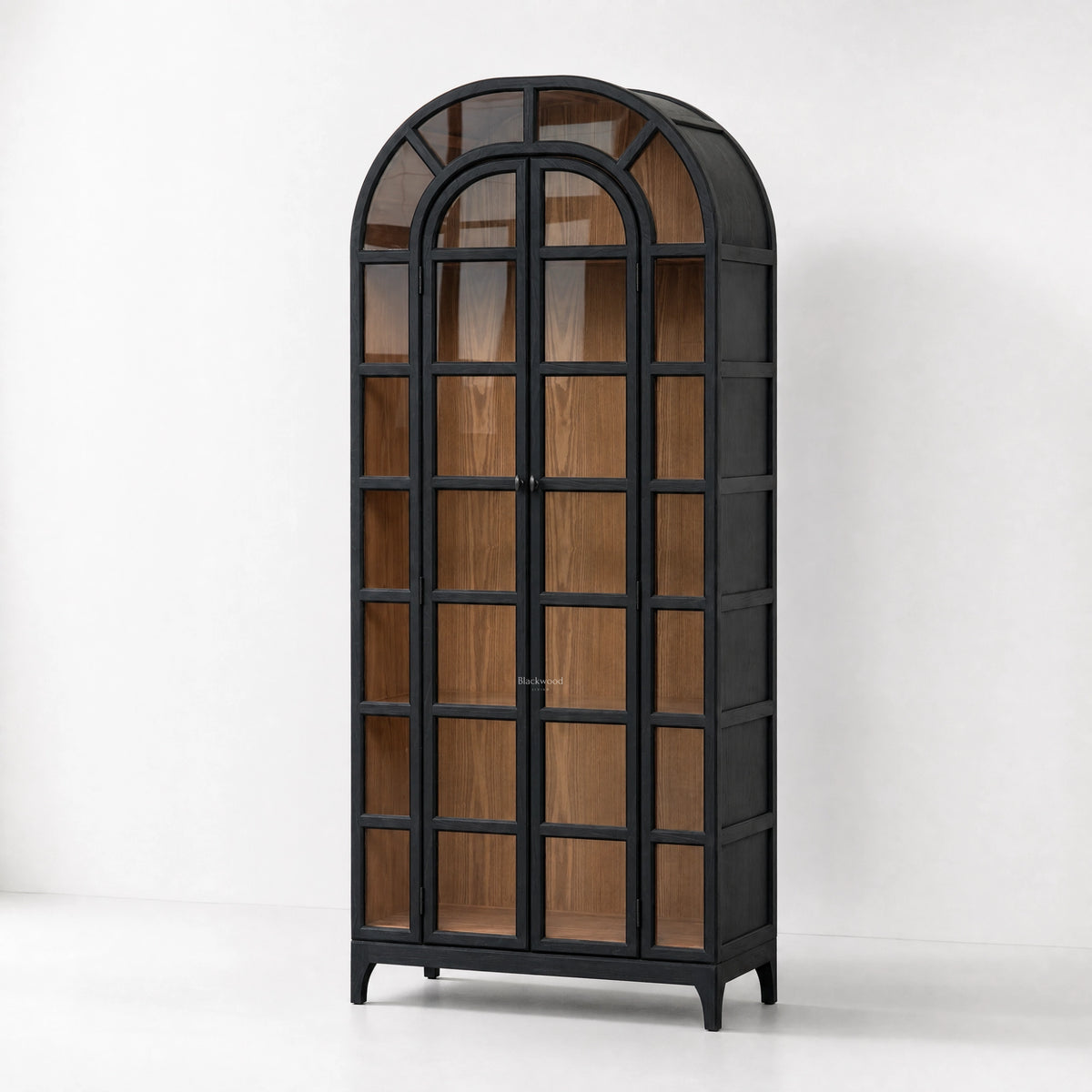 Tall black arched display cabinet with glazed doors revealing warm natural timber interiors and traditional heritage-inspired design.