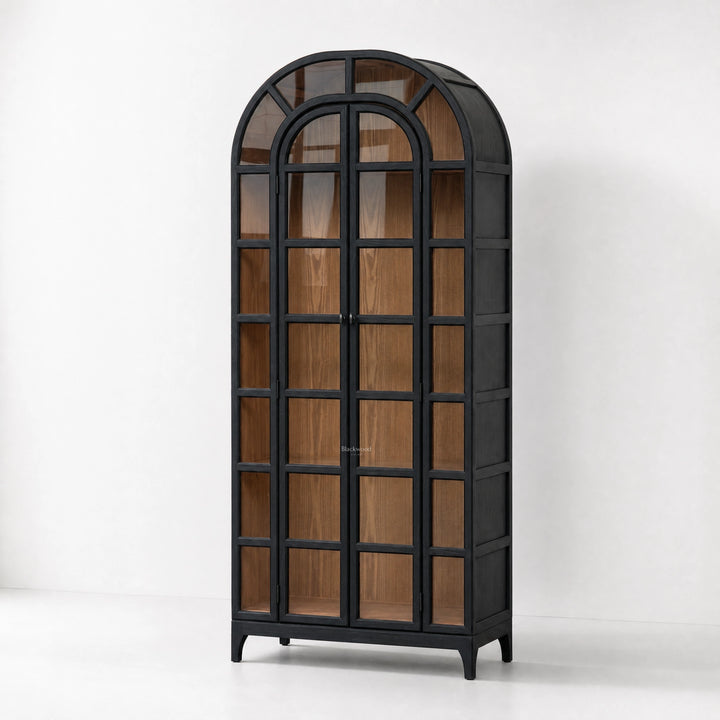 Tall black arched display cabinet with glazed doors revealing warm natural timber interiors and traditional heritage-inspired design.