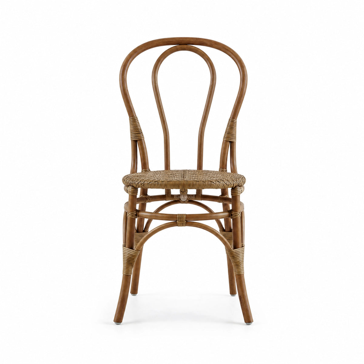 Sika Originals Lulu rattan side chair with curved bentwood frame and woven seat. Sustainable Indonesian rattan bistro chair for relaxed interiors.