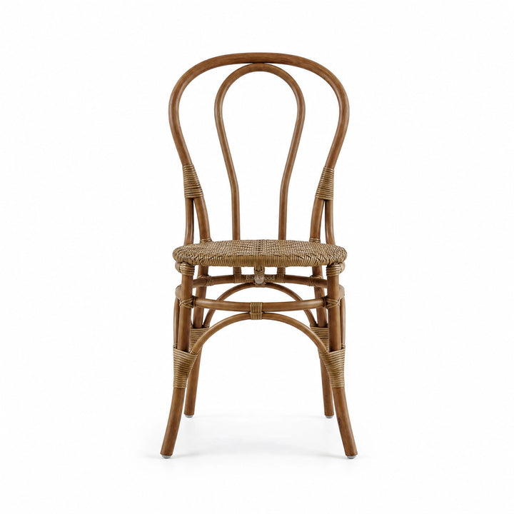 Sika Originals Lulu rattan side chair with curved bentwood frame and woven seat. Sustainable Indonesian rattan bistro chair for relaxed interiors.