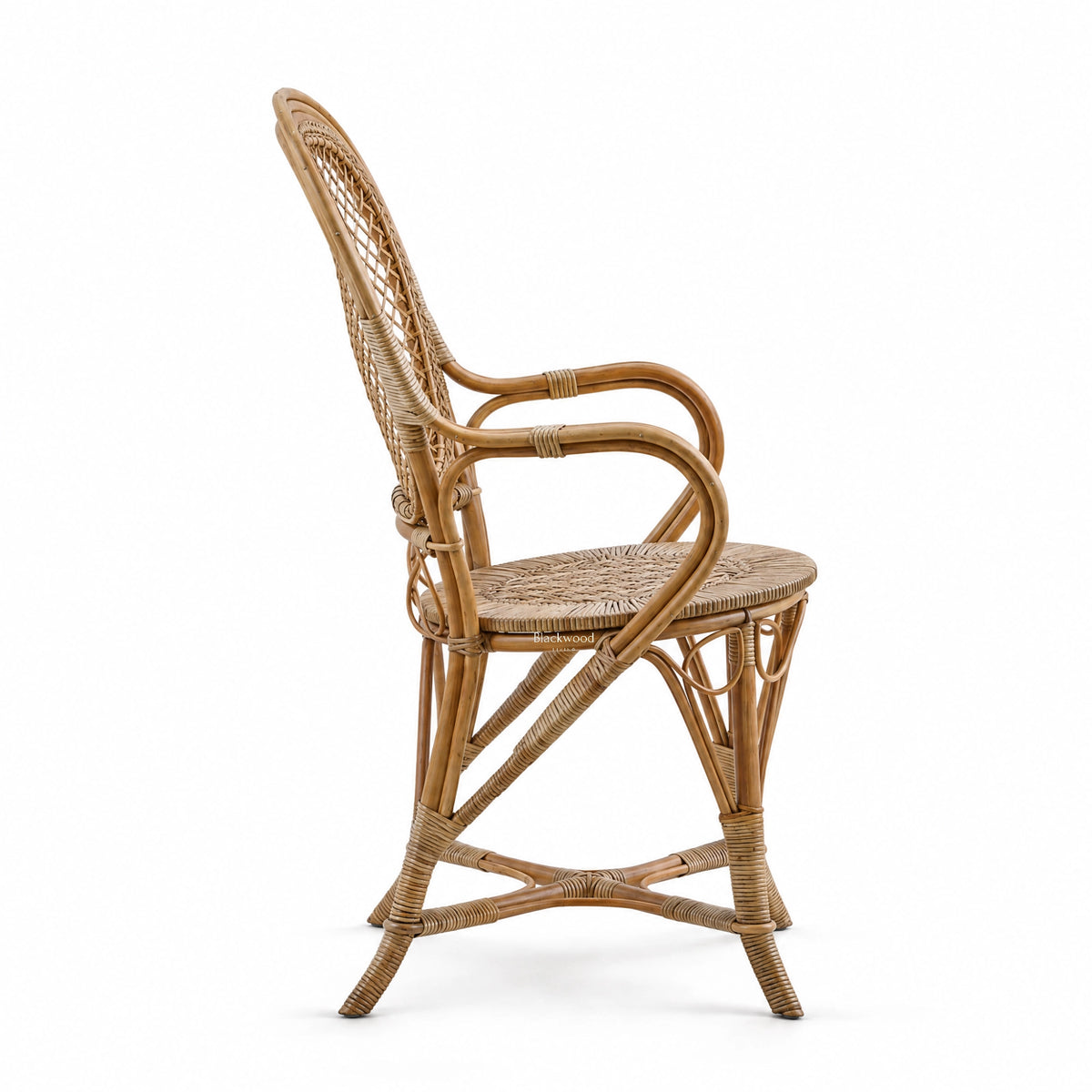 Sika Fleur rattan armchair featuring a graceful curved frame, woven lattice back, and hand-finished wicker detailing.