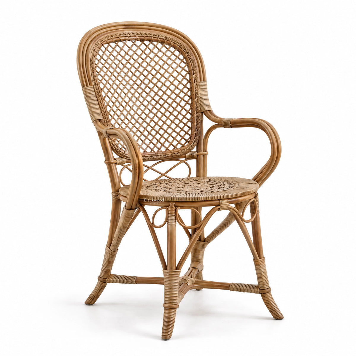 Sika Fleur rattan armchair featuring a graceful curved frame, woven lattice back, and hand-finished detailing for traditional dining room warmth.