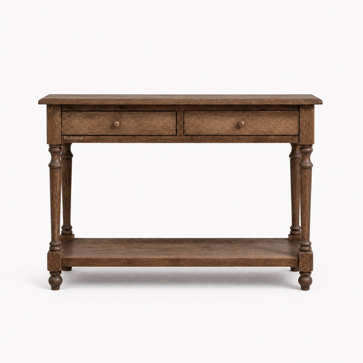 Bordeaux Hall Table in oak with natural grain, two front drawers and lower shelf, turned legs.