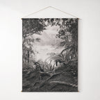 Fiord Wall Hanging: New Zealand fjord landscape on textured canvas, monochrome, suspended from a wooden dowel.