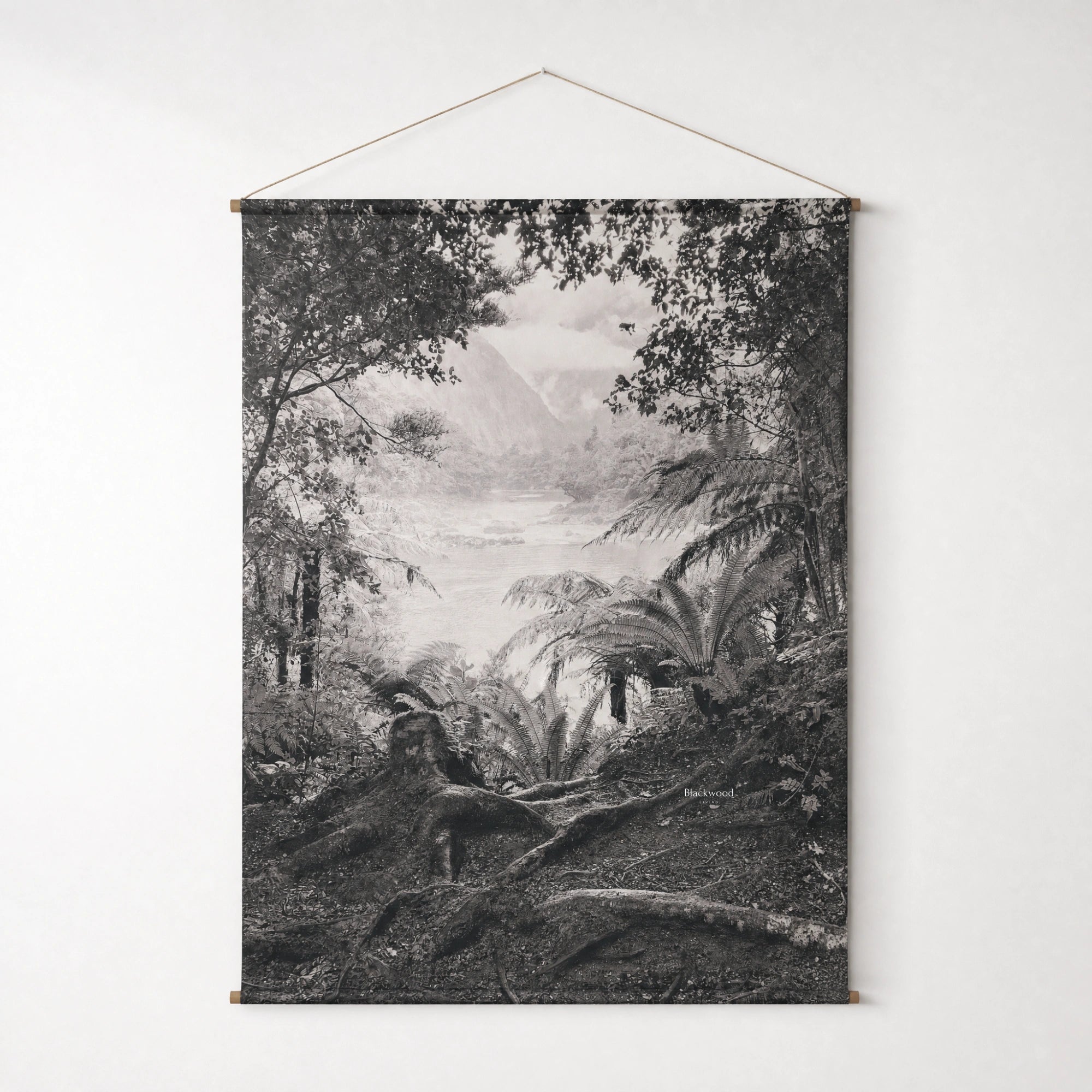 Fiord Wall Hanging: New Zealand fjord landscape on textured canvas, monochrome, suspended from a wooden dowel.