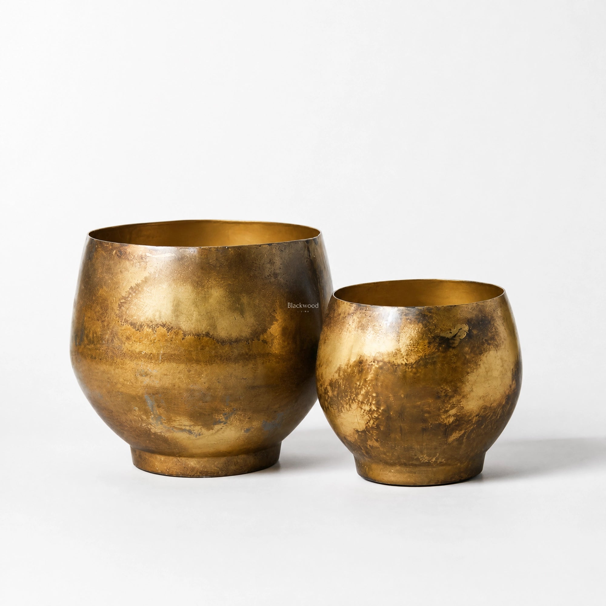 Taj Planters Set/2: two handcrafted iron planters with antiqued gold finish and aged patina.