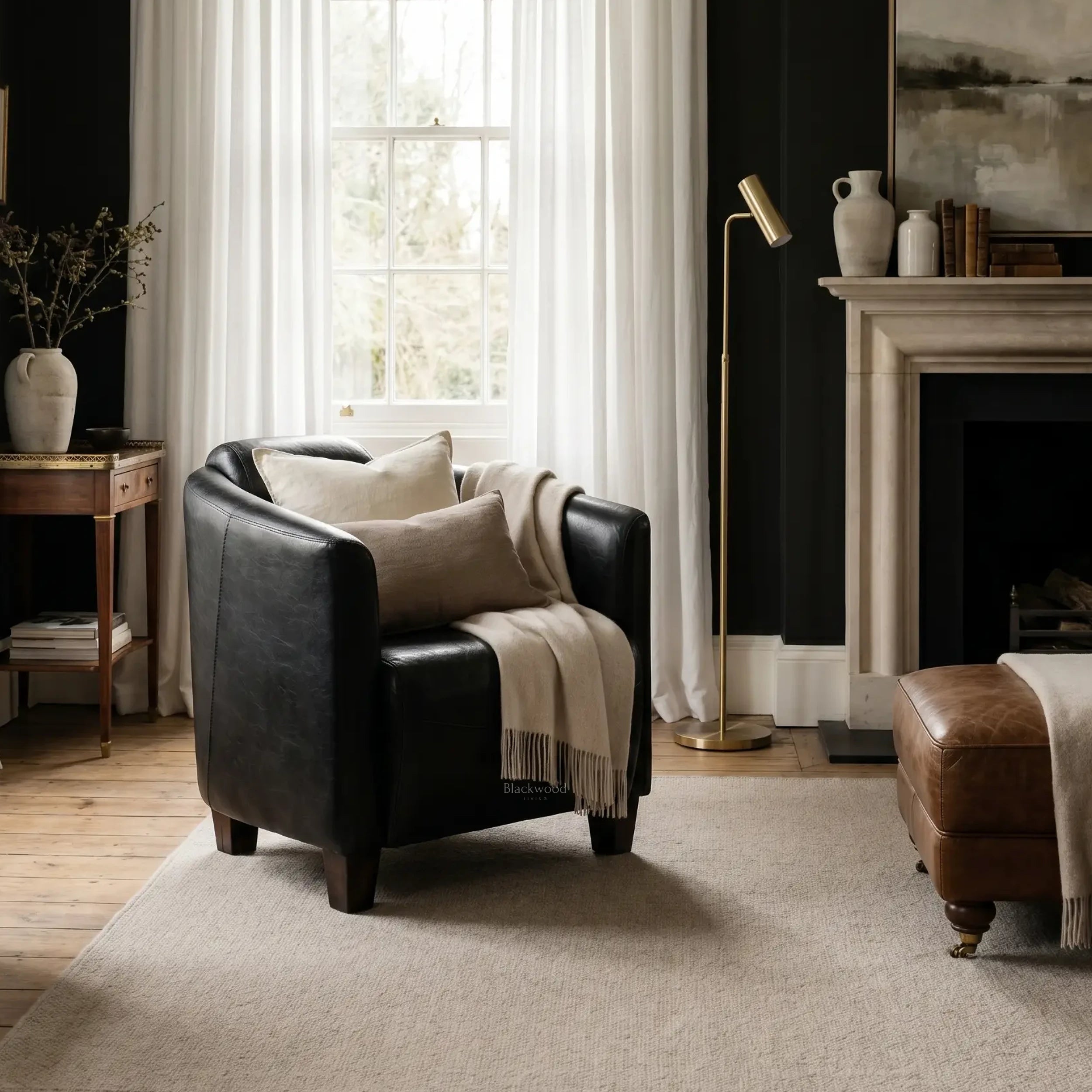 Dalton Club Chair in South American top-grain cow leather with a solid rubber wood frame in a chic living room setting.