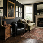 Dalton Club Chair in dark South American top-grain leather with a rubber wood frame anchors a refined living room.