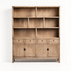 Fairhaven Wall Unit in weathered pine with a softly aged finish, coastal-style storage with open cubbies and drawers.