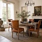 Beaumont Dining Chair - Vintage Tan with South American top-grain leather in a warm, traditional dining room.