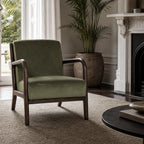 Java Occasional Chair with dark oak frame and Rainforest green velvet upholstery in a refined living room.