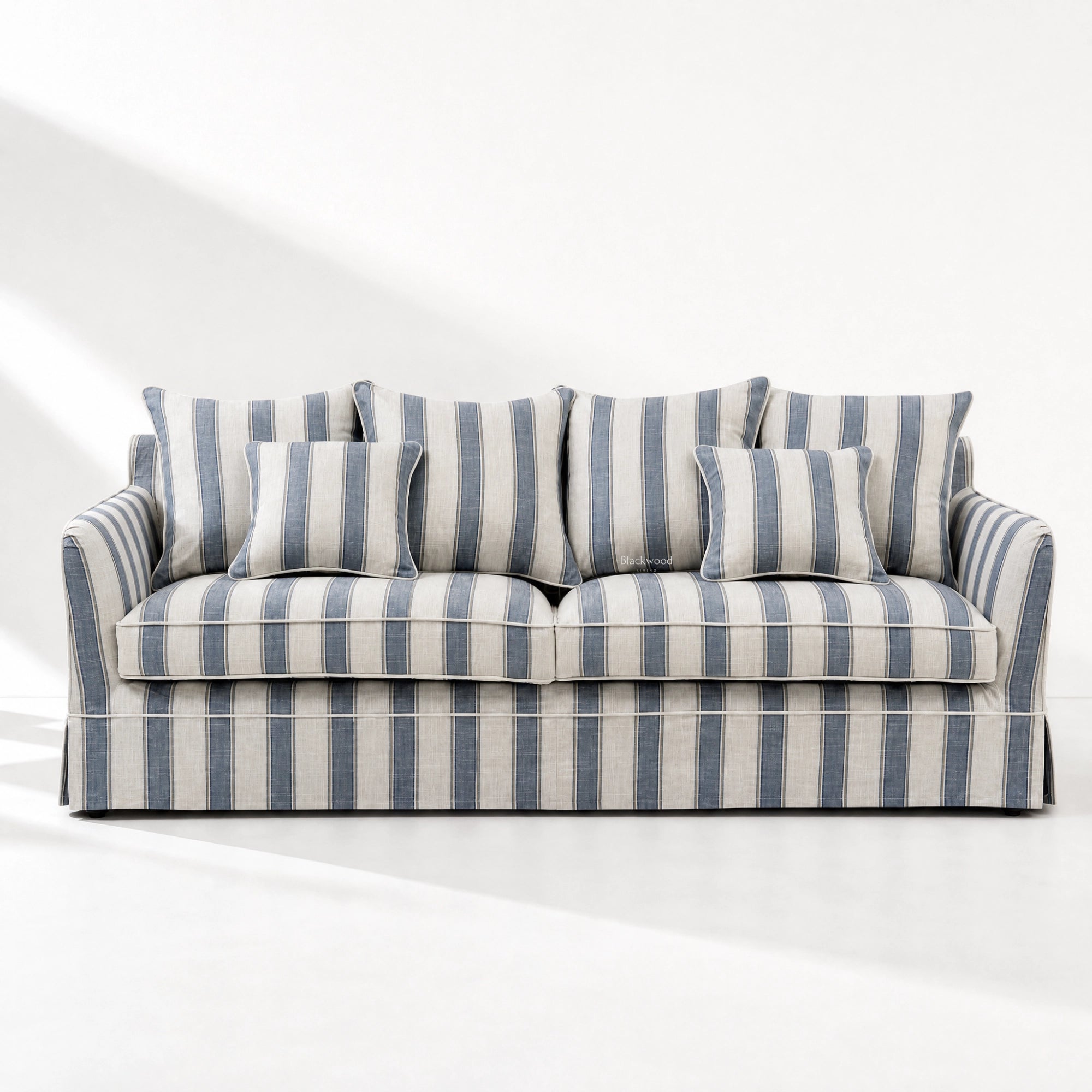 Newport 3-seat sofa in mariner blue stripe linen-blend slipcover with generous cushions and tailored skirt.