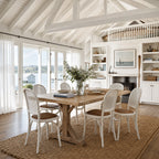 Whitehaven Dining Chair with solid oak and handwoven rattan detailing in a coastal dining room.
