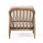 Devonport Chair with solid ash, soft whitewashed finish, natural rattan detailing, and generously upholstered cushions.