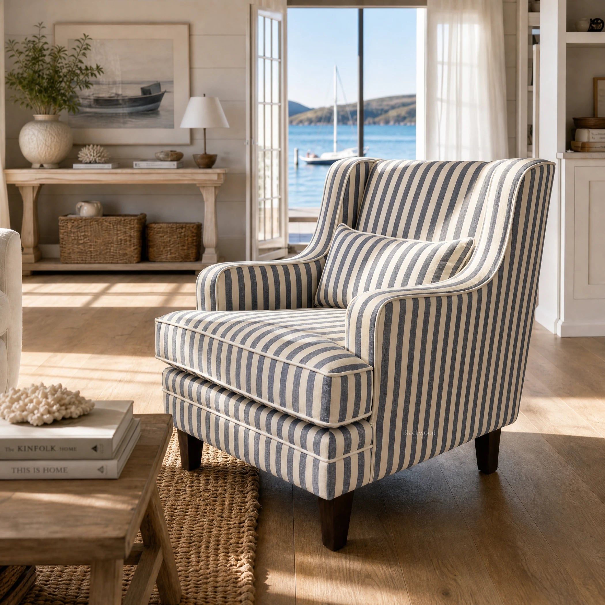 Southport Chair with striped upholstery and plush cushioning in a sunlit coastal living room