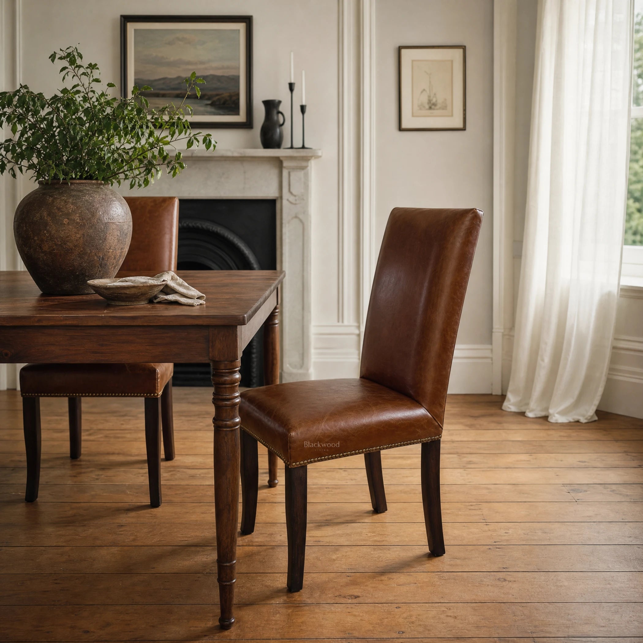Manor Dining Chair in South American top-grain cow leather with hand-applied brass nailhead trim.